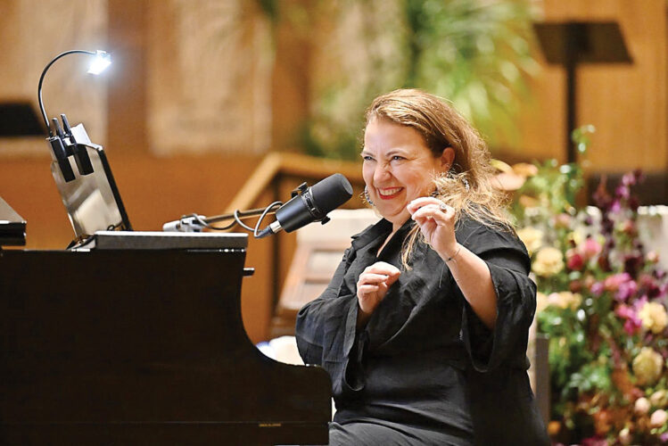 Every Song a Prayer: Augustin’s career has roots in faith, music and Morgantown